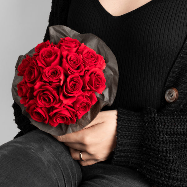 Infinity Roses in Bouquet is held by a Woman